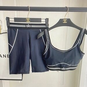 ALO Yoga Black Leggings with White Accents